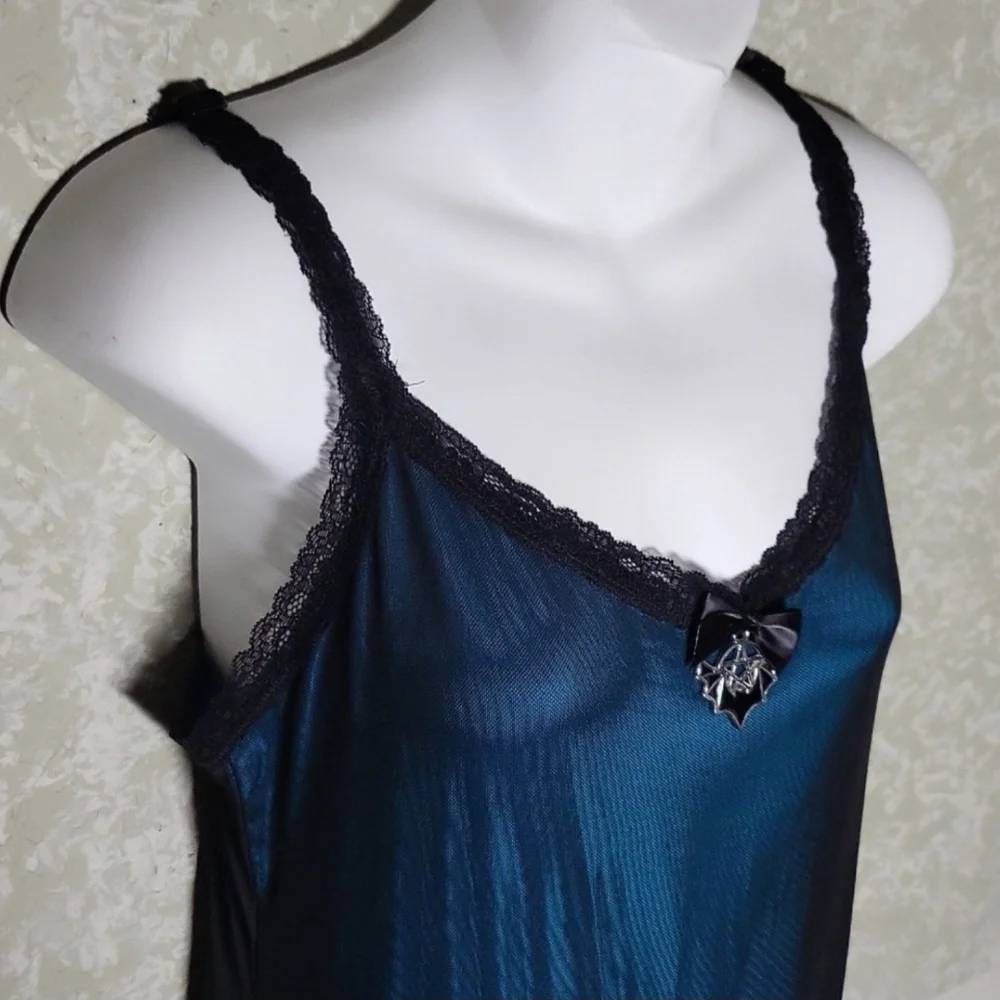 Chic Asymmetrical Teal Dress with Black Trim - Picture 4 of 9
